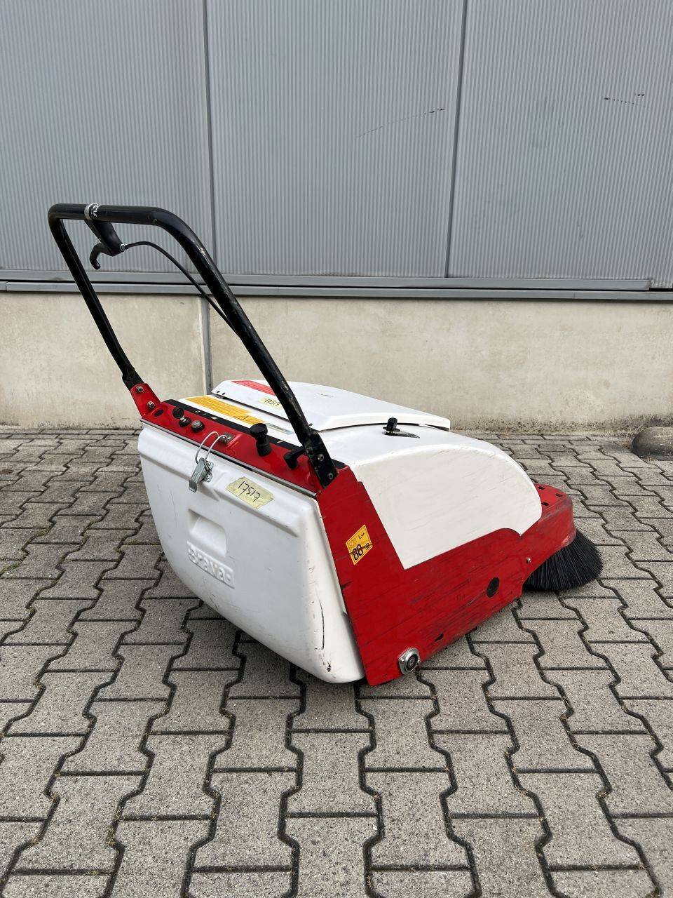 Pedestrian vacuum sweeper
